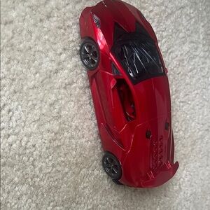 Sleek Red and Black Toy Car with Sporty Design